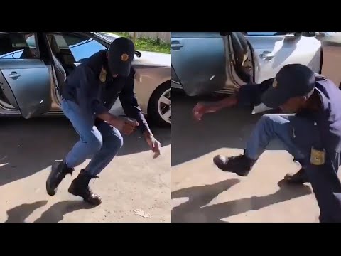 Police Officer Doing The Vosho Dance 